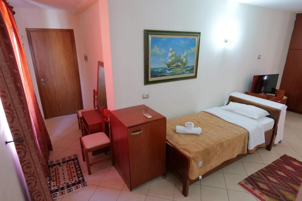 Postel nebo postele na pokoji v ubytování Hotel Veli