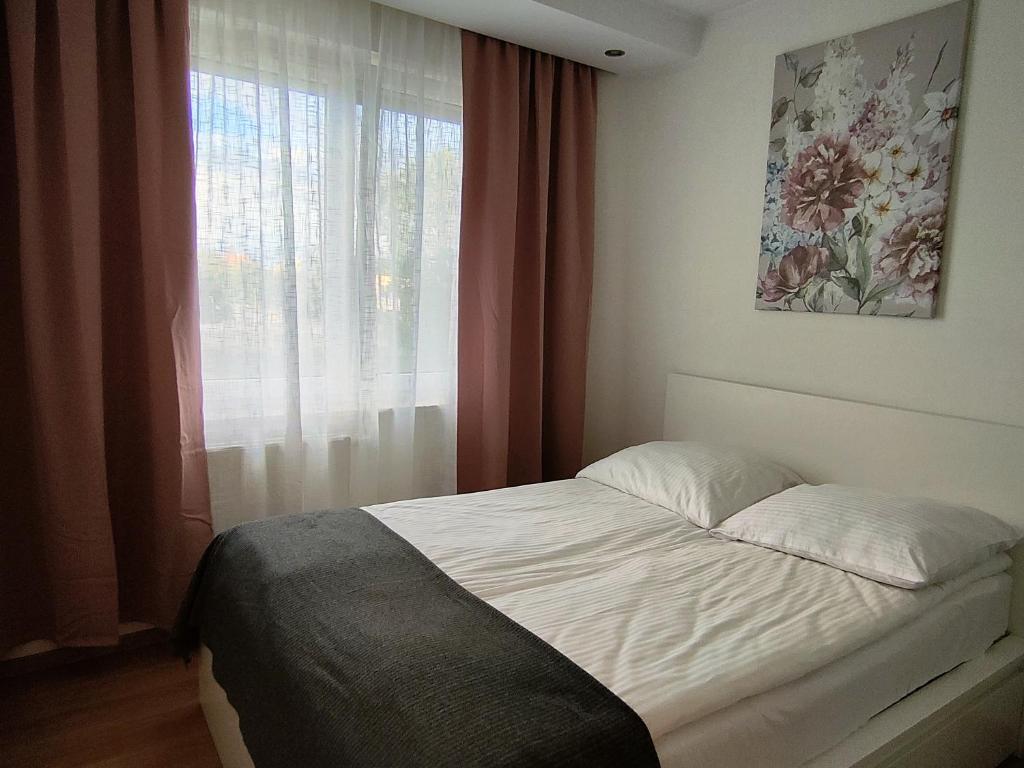 Posteľ alebo postele v izbe v ubytovaní Apartament F&J #12