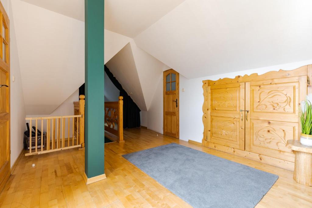 Posteľ alebo postele v izbe v ubytovaní Apartamenty Butorowy Zakopane