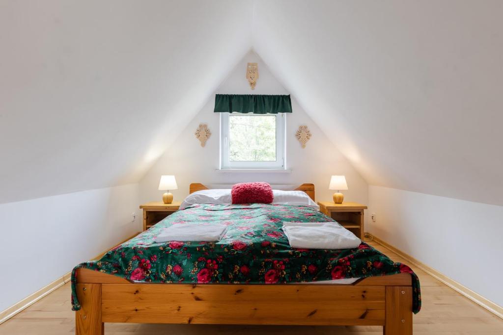 Posteľ alebo postele v izbe v ubytovaní Apartamenty Butorowy Zakopane