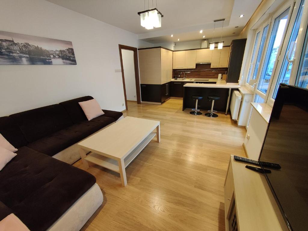 Posedenie v ubytovaní Apartament F&J #12