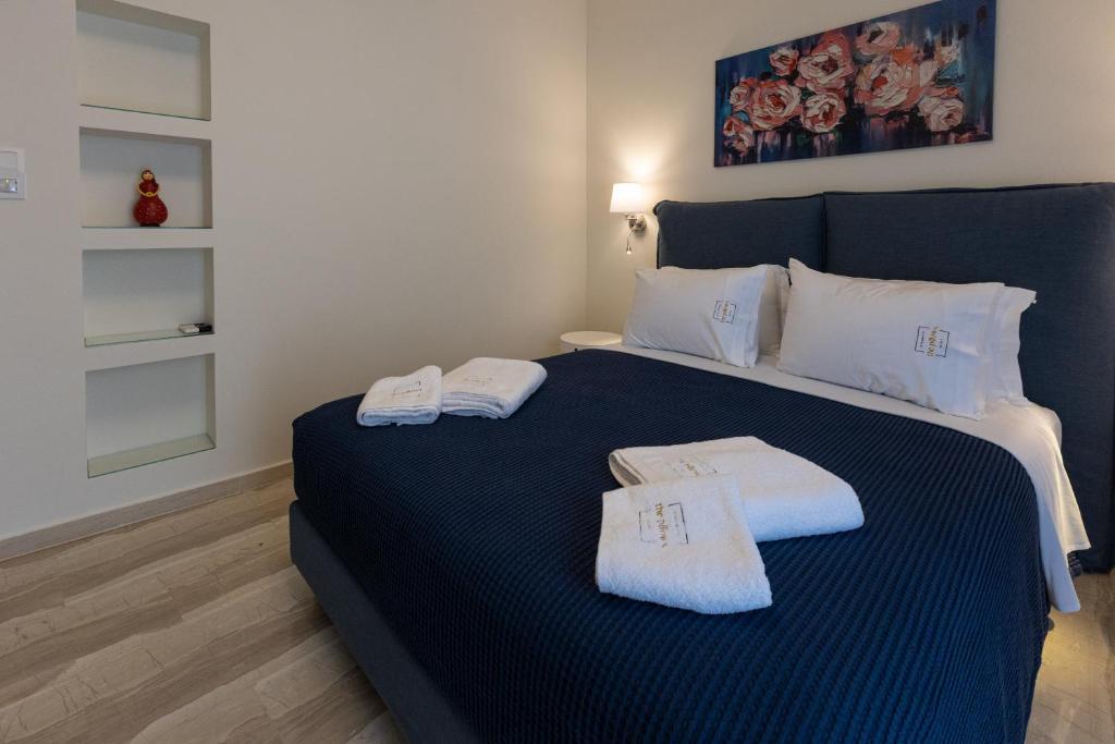 Postel nebo postele na pokoji v ubytování The Pillows Kalamata