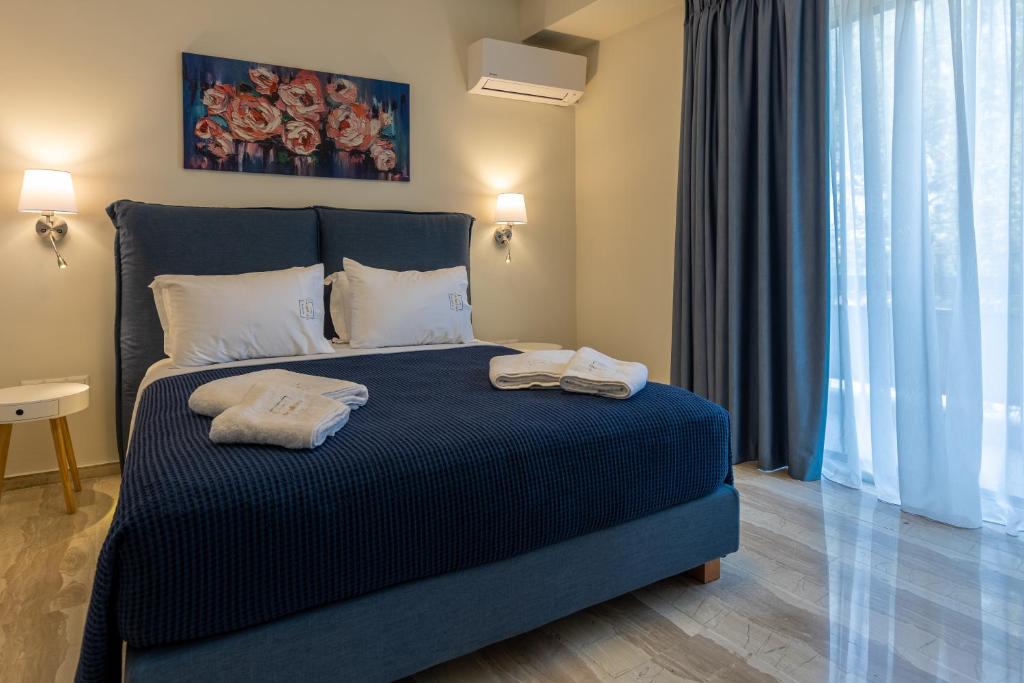 Postel nebo postele na pokoji v ubytování The Pillows Kalamata