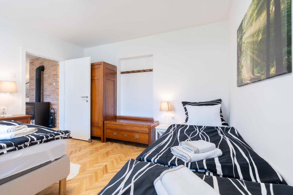 Postel nebo postele na pokoji v ubytování Apartma Peček Kranjska Gora