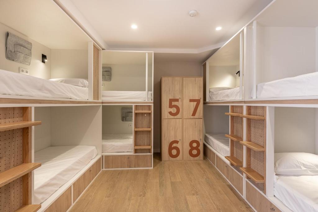 A bed or beds in a room at Líbere Córdoba Patio Santa Marta