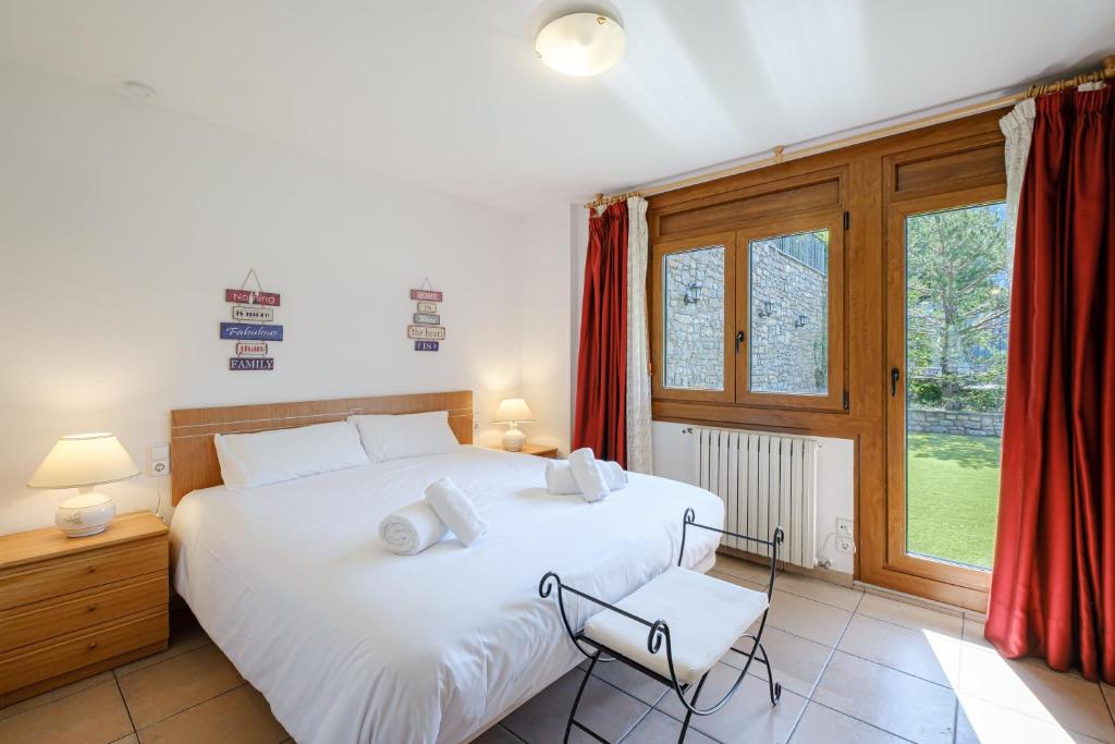 Postel nebo postele na pokoji v ubytování Quiet House Sa Calma