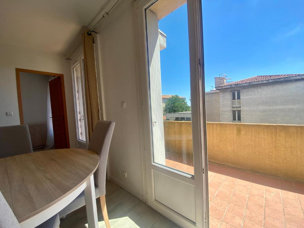Balkón alebo terasa v ubytovaní Les terrasses d'iéna - 2 chambres avec parking privé