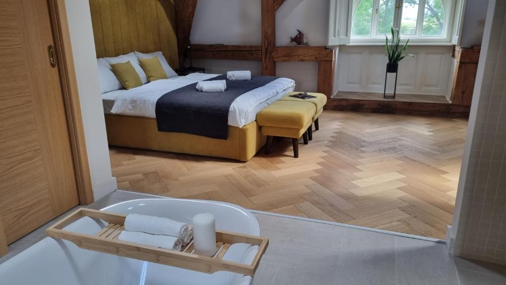 Posteľ alebo postele v izbe v ubytovaní MANOR Boutique Hotel