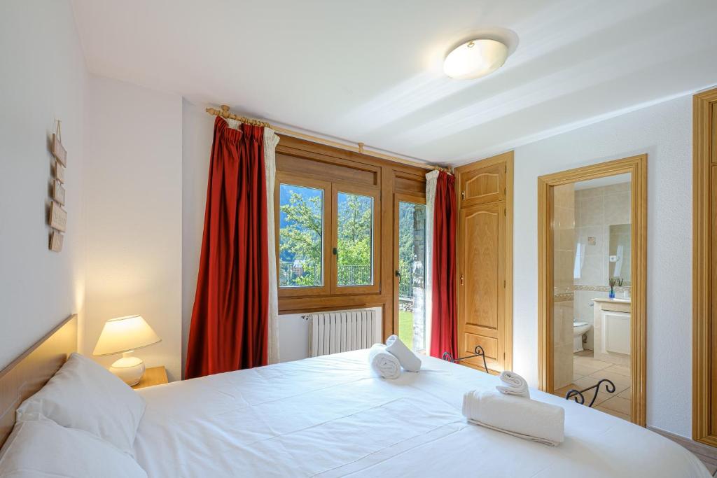 Postel nebo postele na pokoji v ubytování Quiet House Sa Calma