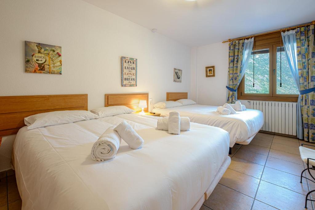Postel nebo postele na pokoji v ubytování Quiet House Sa Calma