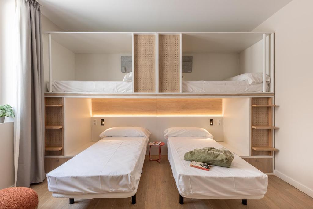 A bed or beds in a room at Líbere Córdoba Patio Santa Marta