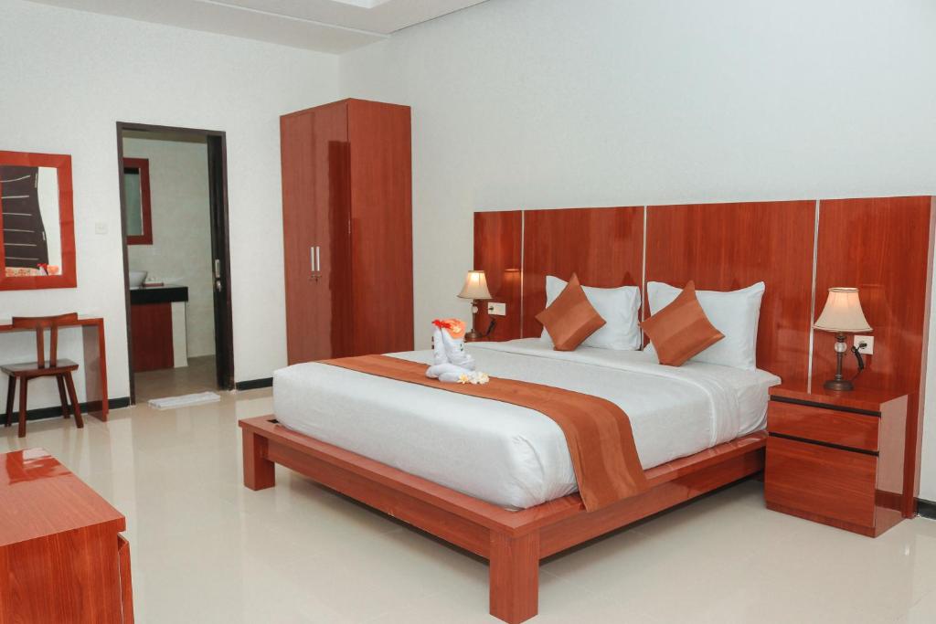 Postel nebo postele na pokoji v ubytování Argya Santi Suite and Villas