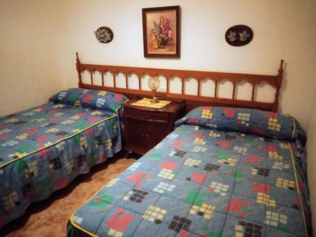 Łóżko lub łóżka w pokoju w obiekcie Piso de 4 habitaciones