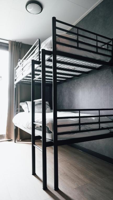 Postel nebo postele na pokoji v ubytování Hotel Biesbosch