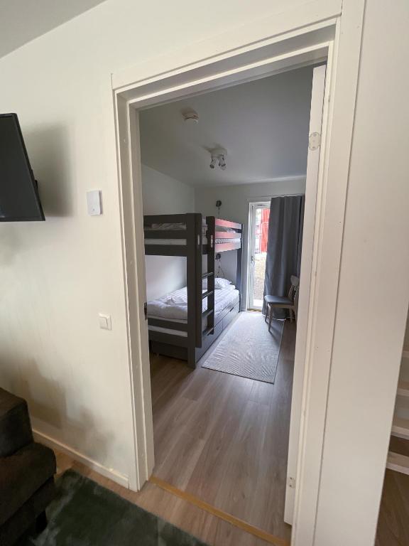 Postel nebo postele na pokoji v ubytování Rocklunda Village