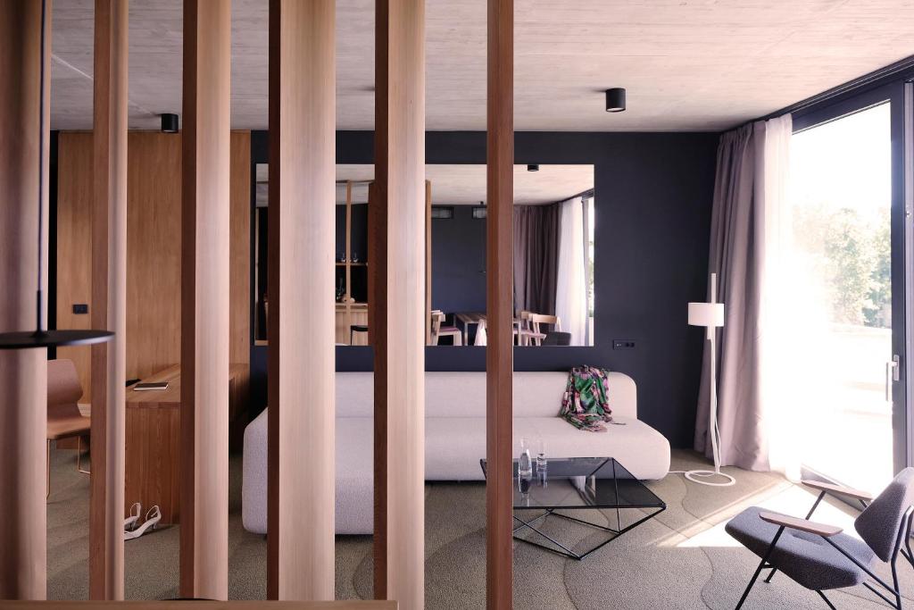 Postel nebo postele na pokoji v ubytování Hotel Osmolis