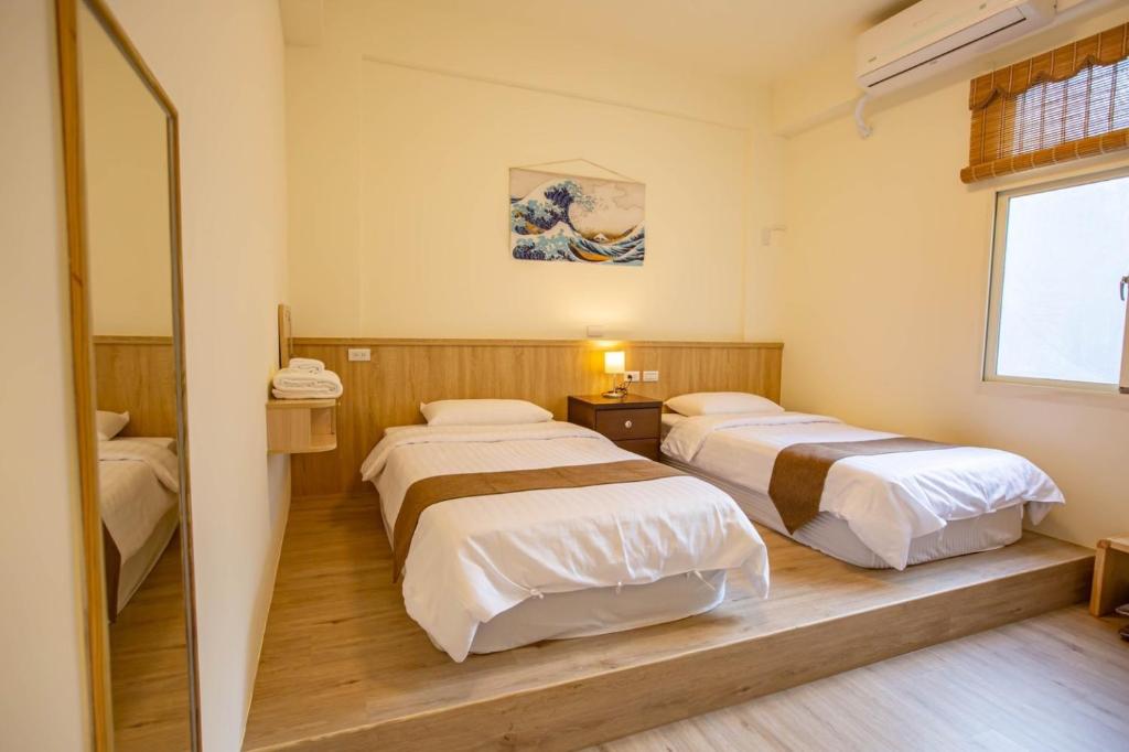 Letto o letti in una camera di Meet Xiashu
