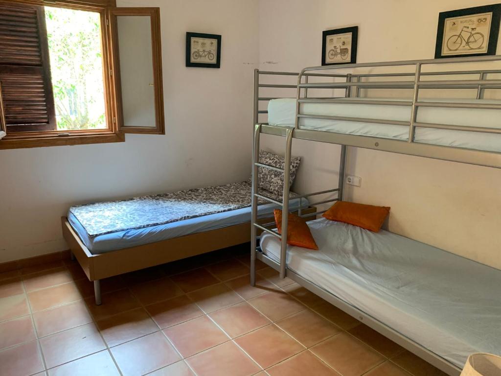 Postel nebo postele na pokoji v ubytování Gemütliches Ferienhaus am Club Nautico, Santa Ponça