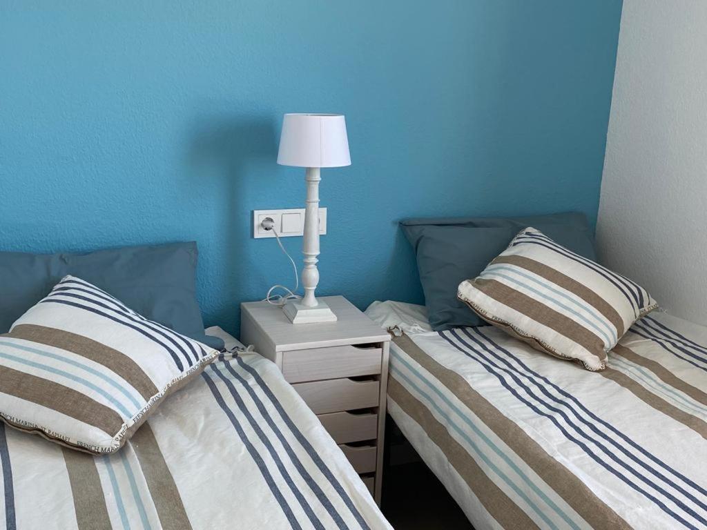 Posteľ alebo postele v izbe v ubytovaní Apartamentos Stil Mar Anna - Stil Port Mar Anna