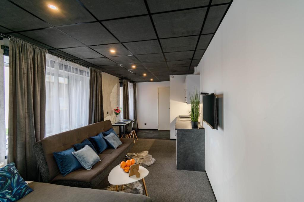 Posezení v ubytování Apartments24 Ilu