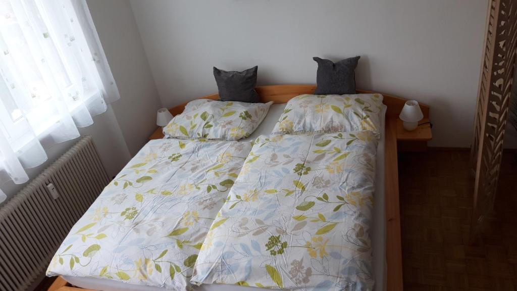 Llit o llits en una habitació de Capital Apartment salzburg