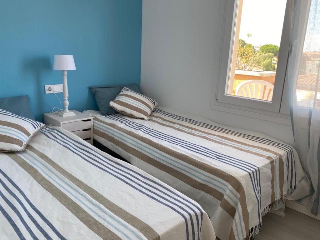 Posteľ alebo postele v izbe v ubytovaní Apartamentos Stil Mar Anna - Stil Port Mar Anna