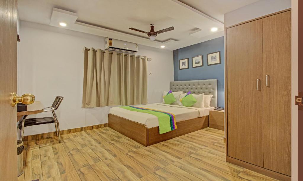 Postel nebo postele na pokoji v ubytování Hotel Royal Crowne near Kolkata Airport