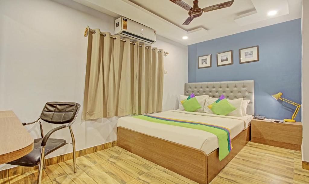 Postel nebo postele na pokoji v ubytování Hotel Royal Crowne near Kolkata Airport
