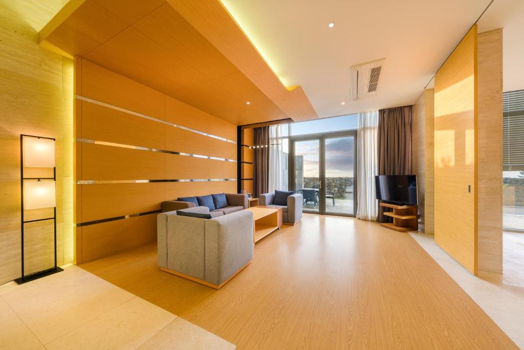 TV a/nebo společenská místnost v ubytování STANFORD Hotel & Resort Jeju