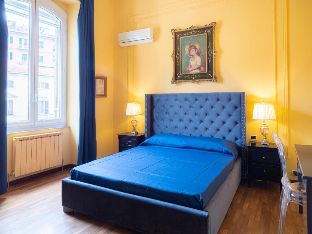Postel nebo postele na pokoji v ubytování L'Opera Rooms & Suite