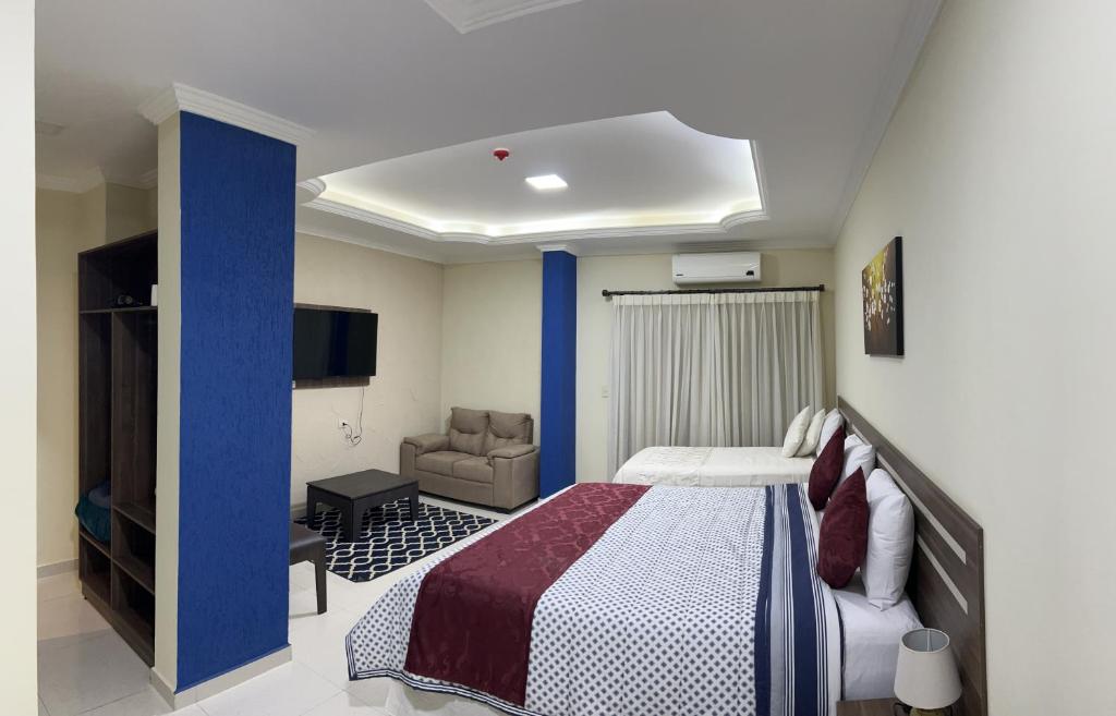 Postel nebo postele na pokoji v ubytování Hotel del Parque