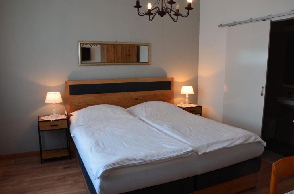 Postel nebo postele na pokoji v ubytování Gästezimmer Klinger-Tongisch