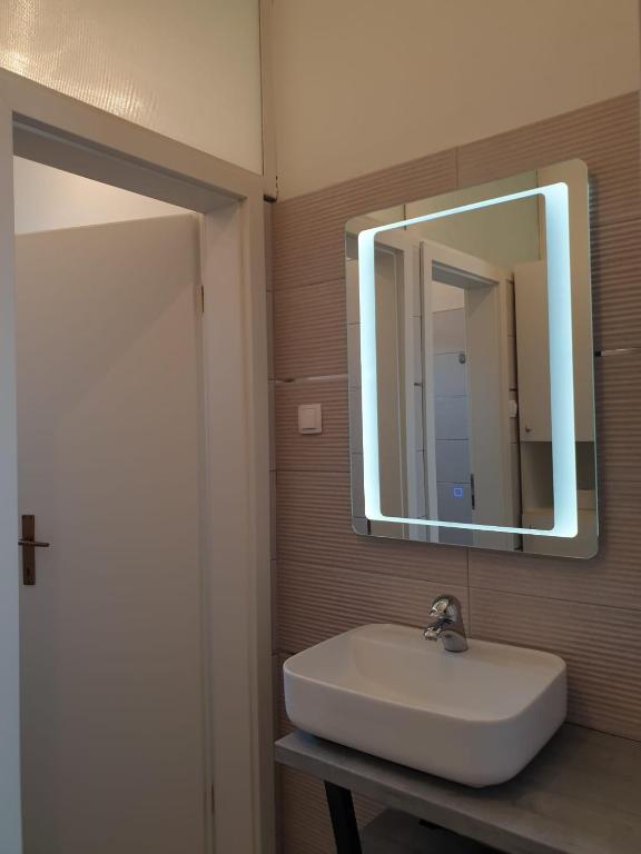 Koupelna v ubytování Apartments Ivana