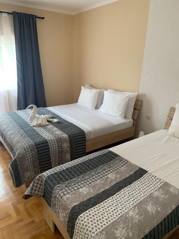 Voodi või voodid majutusasutuse Vila Siki toas