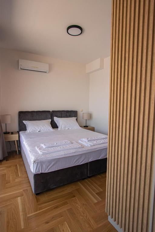 Postel nebo postele na pokoji v ubytování Vertmont Villa