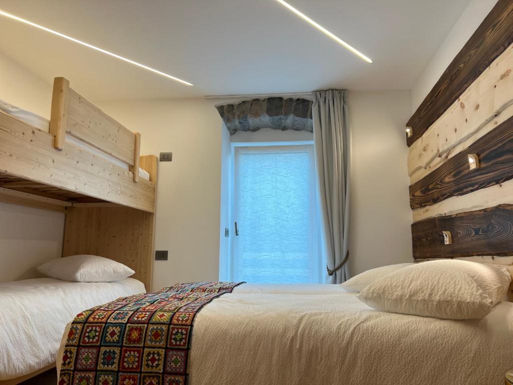 Postel nebo postele na pokoji v ubytování La Balbina B&B