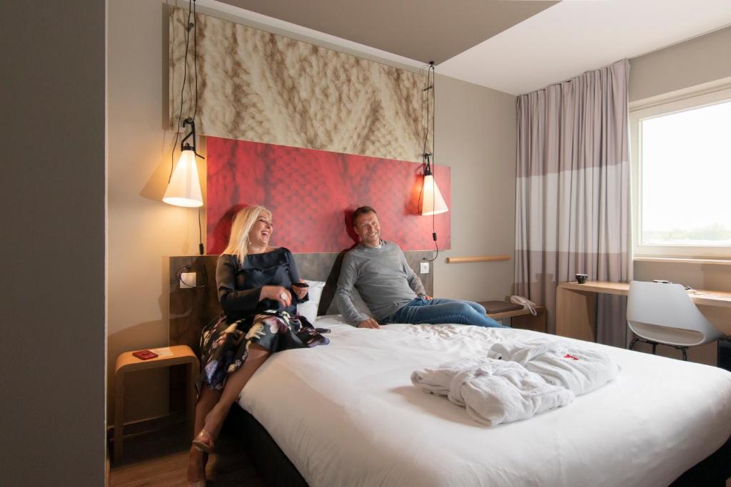 Postel nebo postele na pokoji v ubytování ibis De Haan