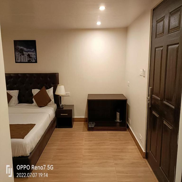 Postel nebo postele na pokoji v ubytování Istana Resort & Spa