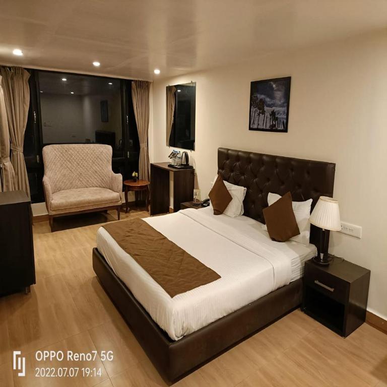 Postel nebo postele na pokoji v ubytování Istana Resort & Spa