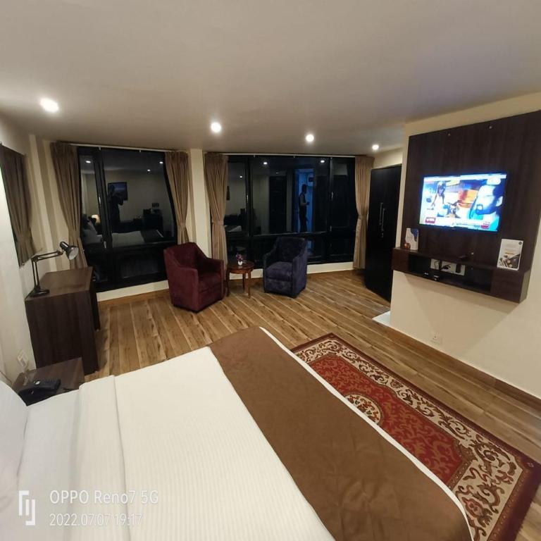 TV a/nebo společenská místnost v ubytování Istana Resort & Spa