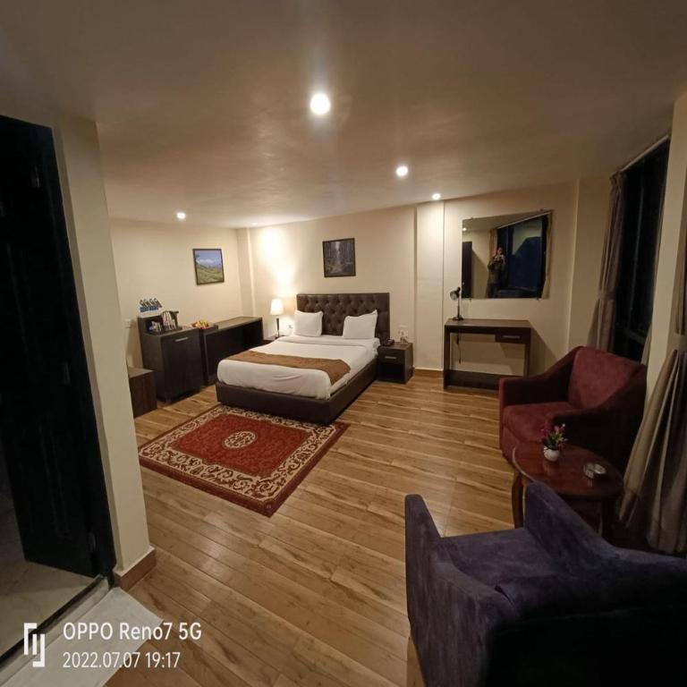 Postel nebo postele na pokoji v ubytování Istana Resort & Spa