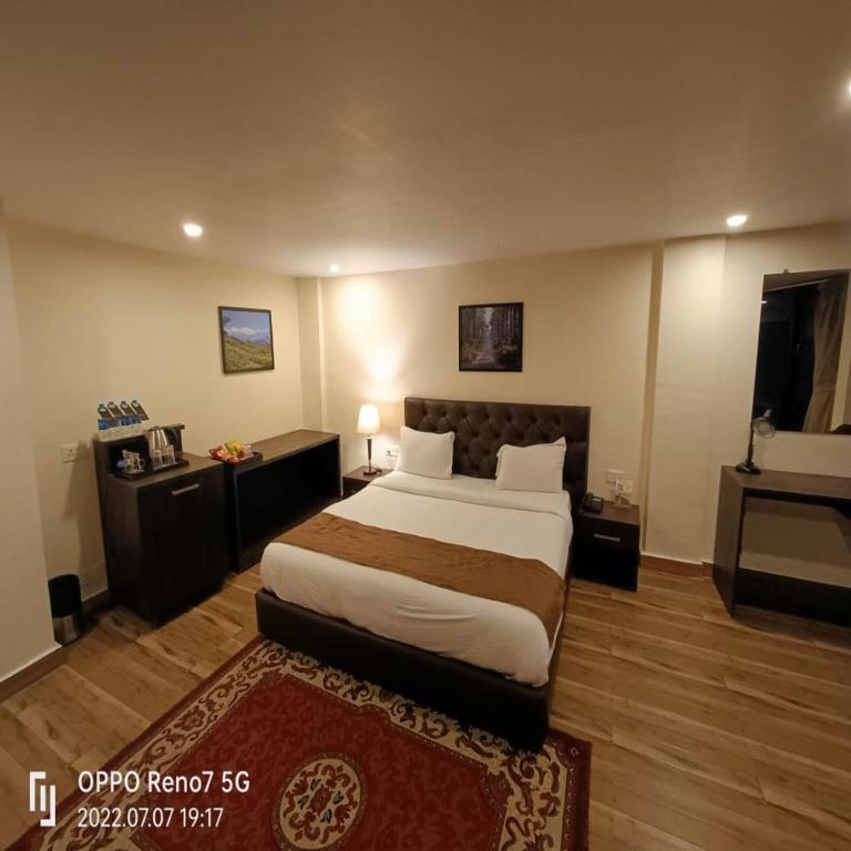 Postel nebo postele na pokoji v ubytování Istana Resort & Spa