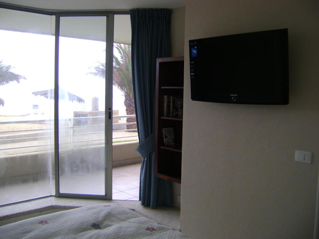 TV a/nebo společenská místnost v ubytování San Alfonso Apartment
