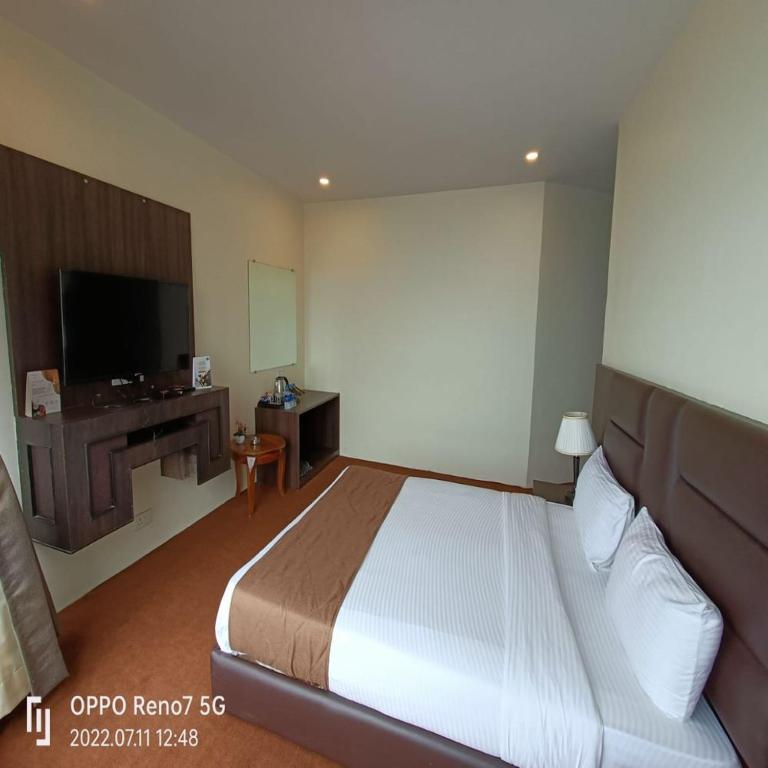 TV a/nebo společenská místnost v ubytování Istana Resort & Spa