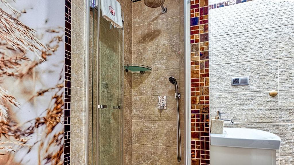 Kúpeľňa v ubytovaní Apartament na Szlaku - 5D Apartamenty