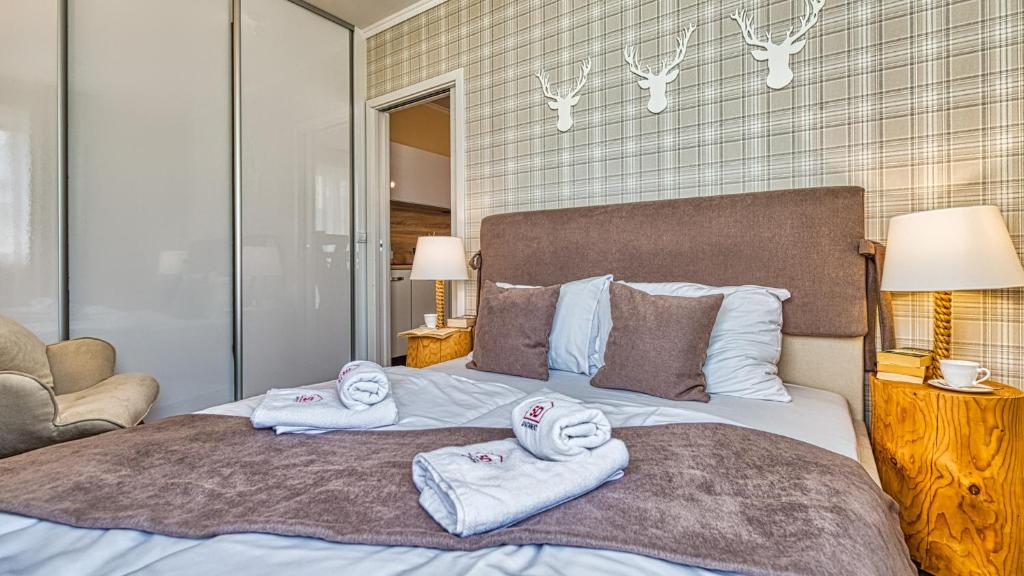 Posteľ alebo postele v izbe v ubytovaní Apartament na Szlaku - 5D Apartamenty