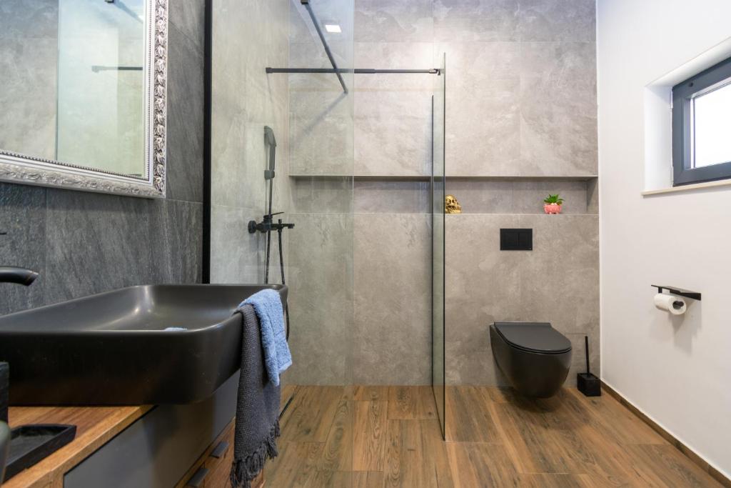Kúpeľňa v ubytovaní Villa Aspera