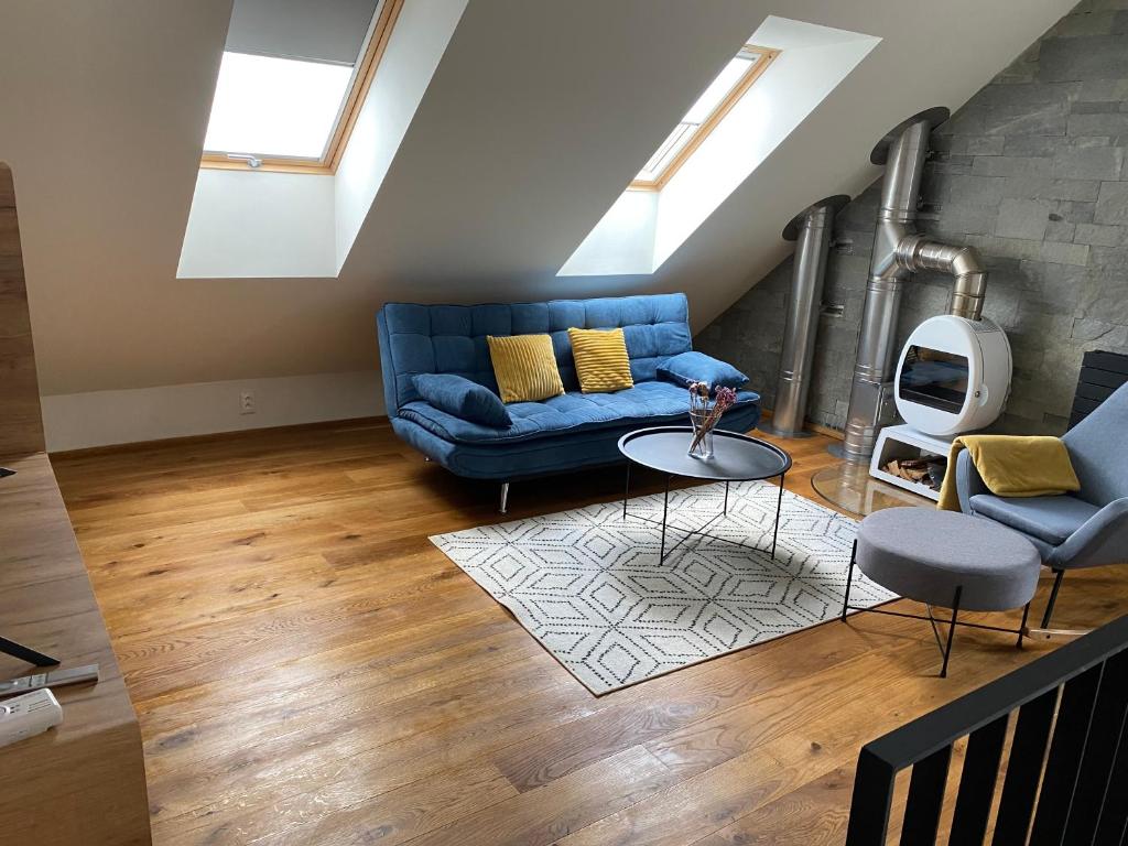 A seating area at Superb Mýto Apartment