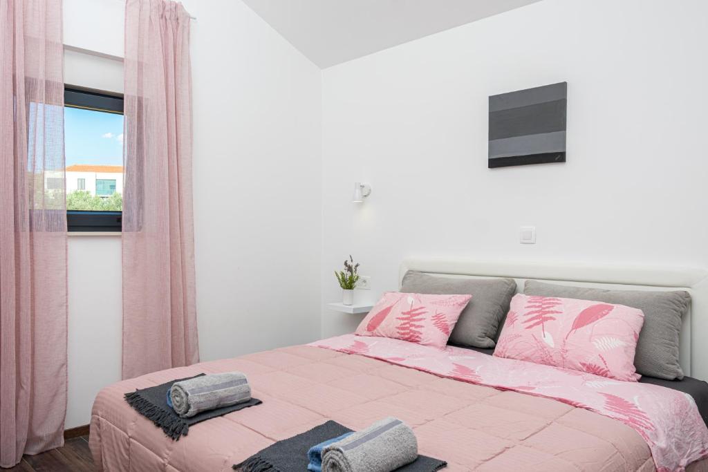 Posteľ alebo postele v izbe v ubytovaní Villa Aspera