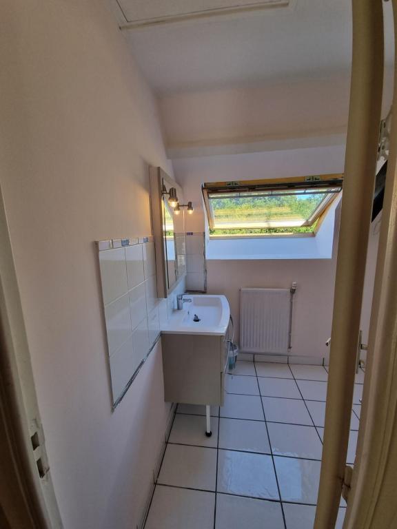 Kuchyň nebo kuchyňský kout v ubytování Chambre Matisse - Closeries du Golfe